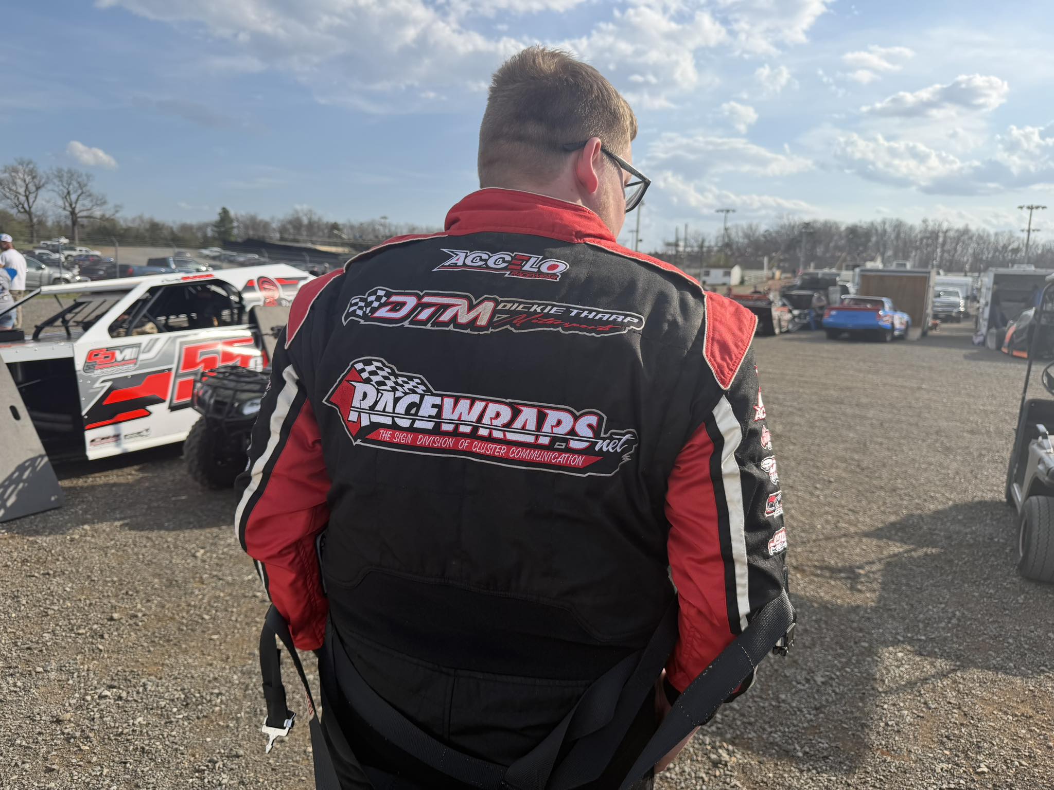 Custom branded racing suit with RaceWraps.net logo by Winchester Signs