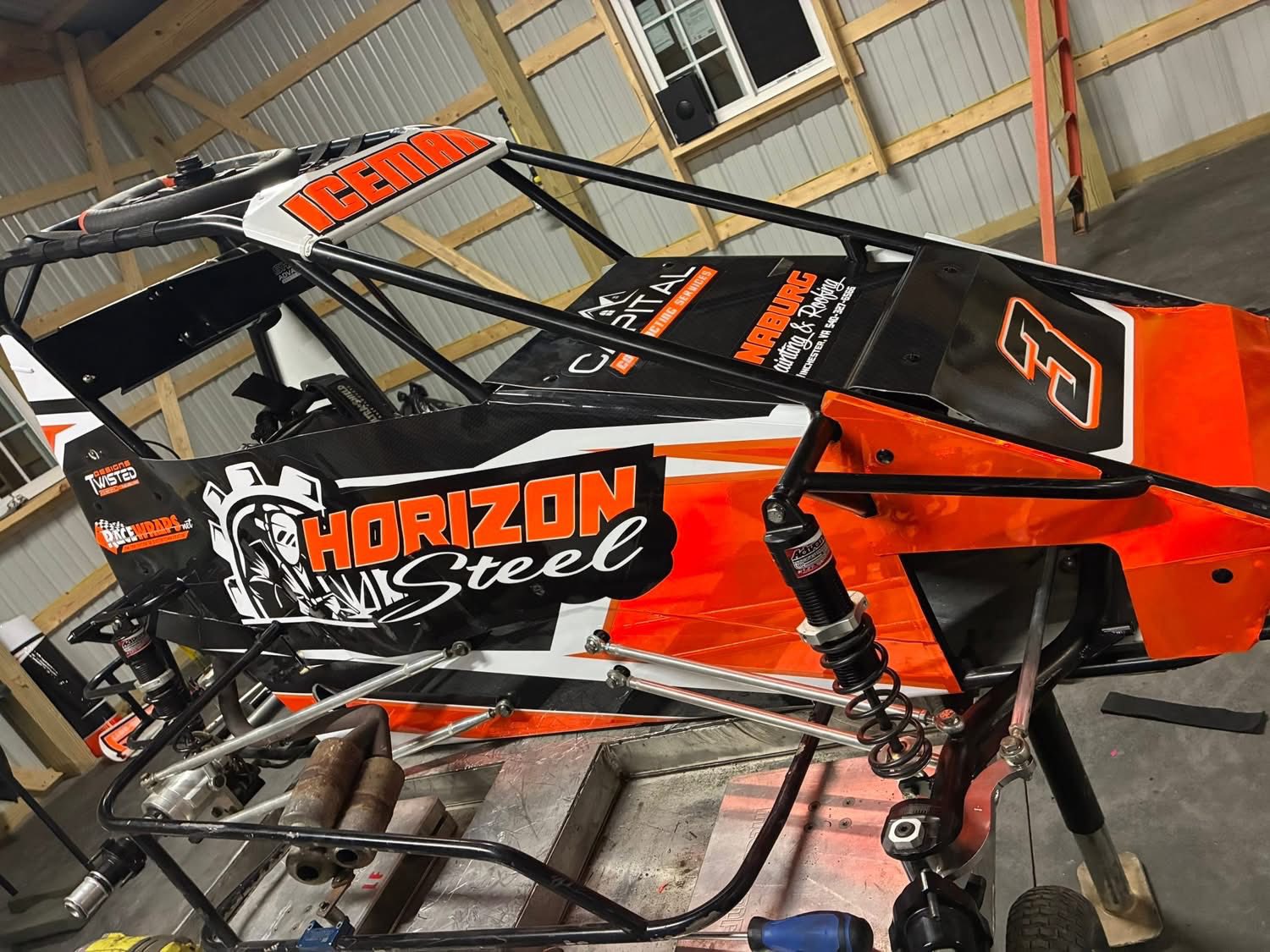 Custom race car wrap with Horizon Steel and sponsor graphics by Winchester Signs