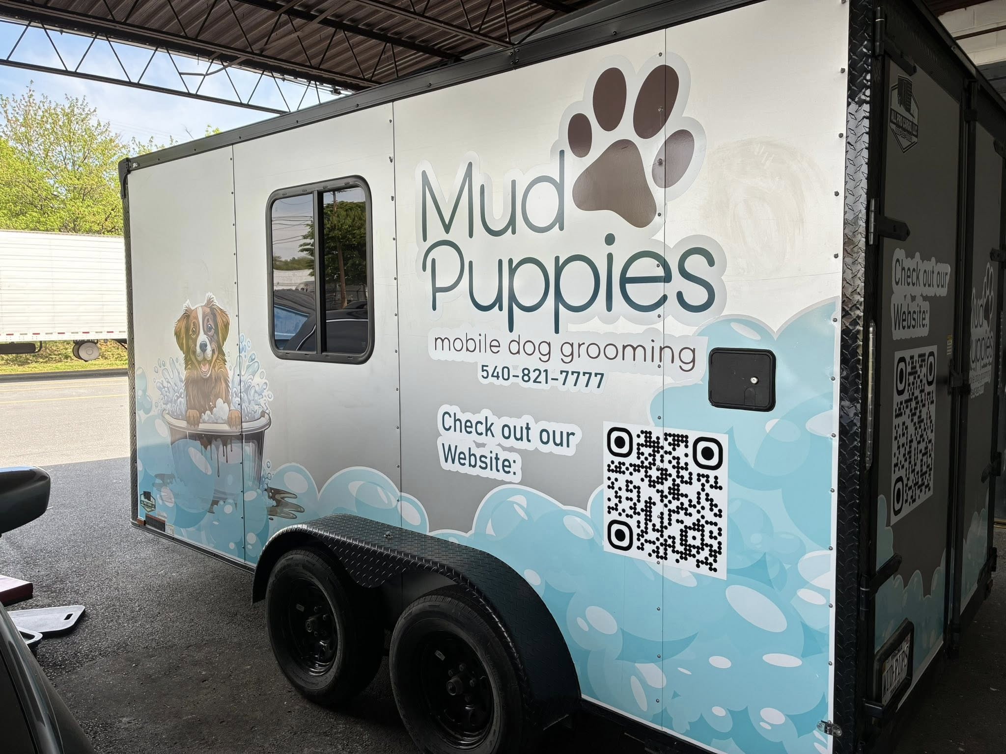 Full trailer wrap for Mud Puppies Mobile Dog Grooming with contact info and QR code