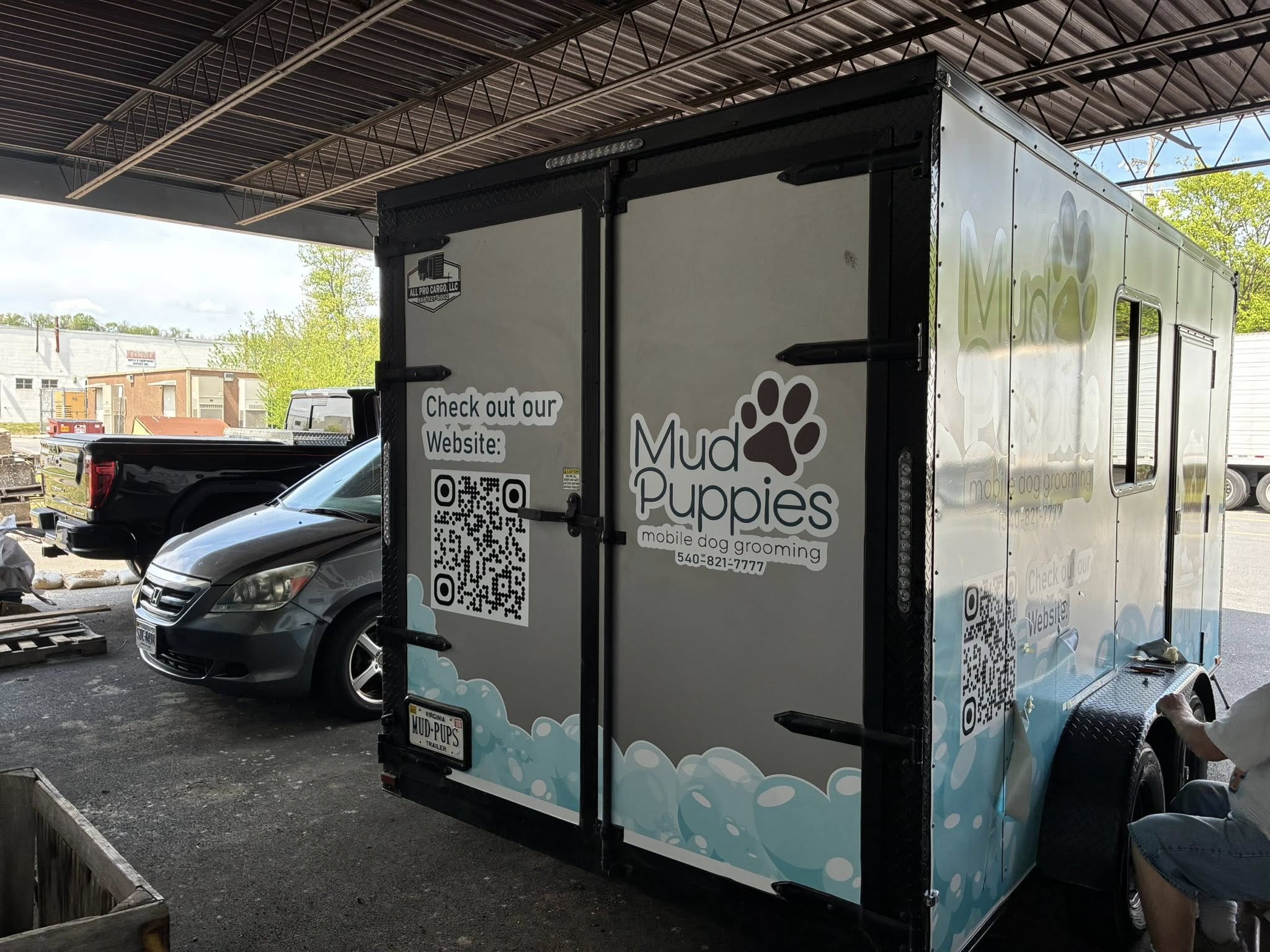 Custom trailer wrap rear view for Mud Puppies Mobile Dog Grooming